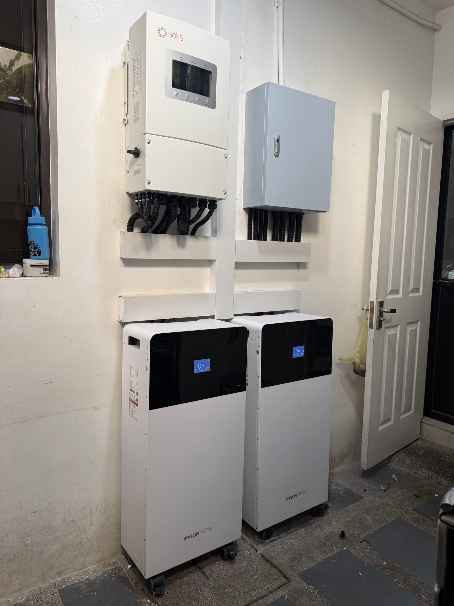 Hybrid inverter and LiFePO4 battery bank installed in a home